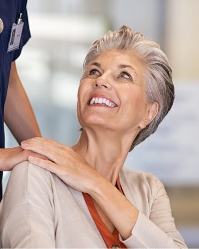 caring-nurse-comforting-old-woman-2022-03-07-17-47-45-utc.jpg